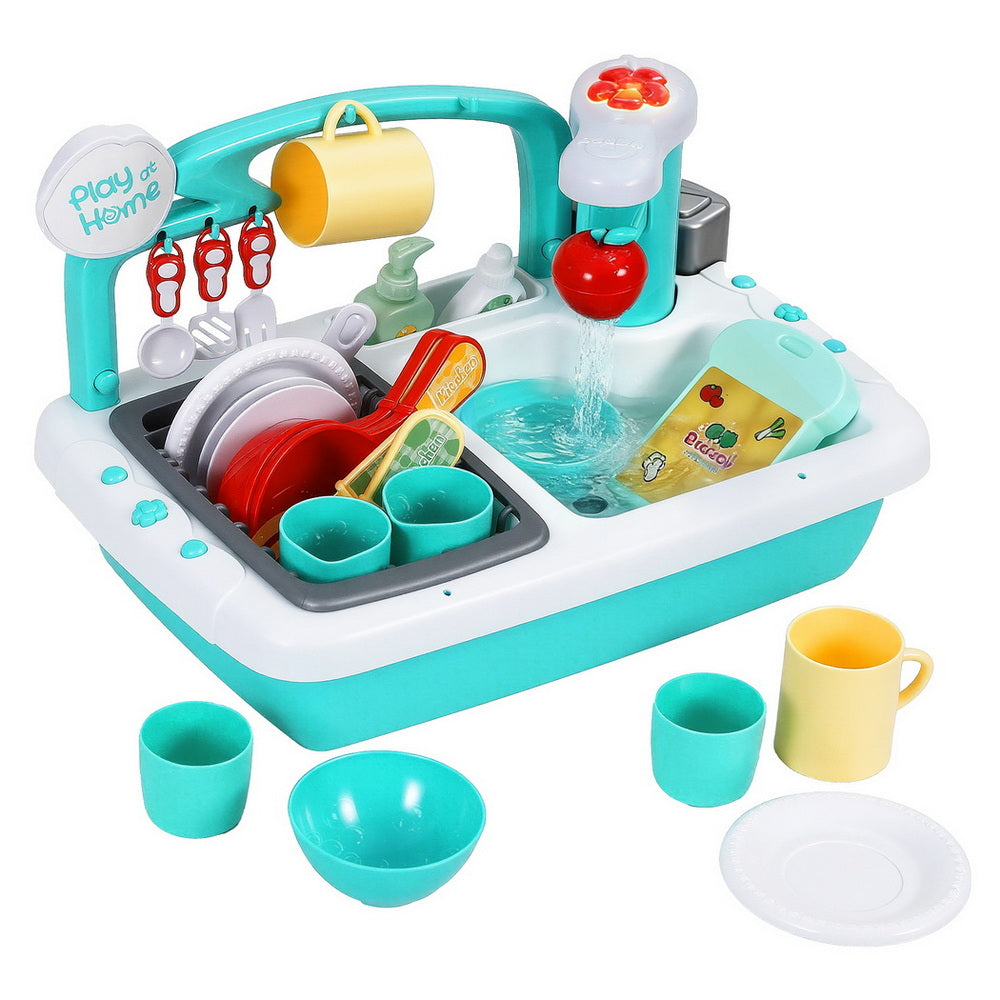 Toy kitchen sink set with utensils and dishes on a white background