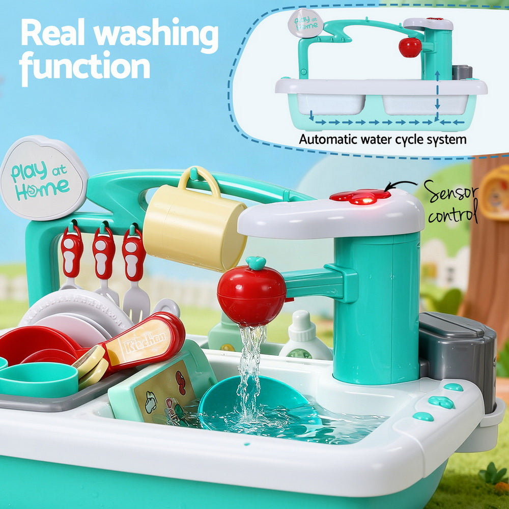 Toy kitchen set with water cycle system and washing function, featuring a sensor control.