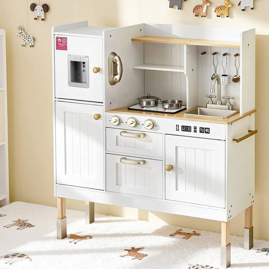 White children's play kitchen with wooden accents on a light-colored floor.