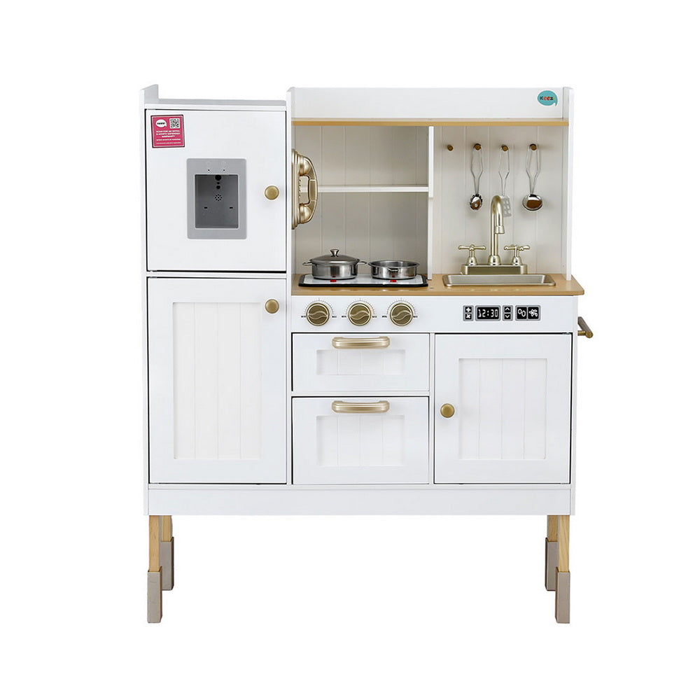 White toy kitchen set with gold accents on a white background
