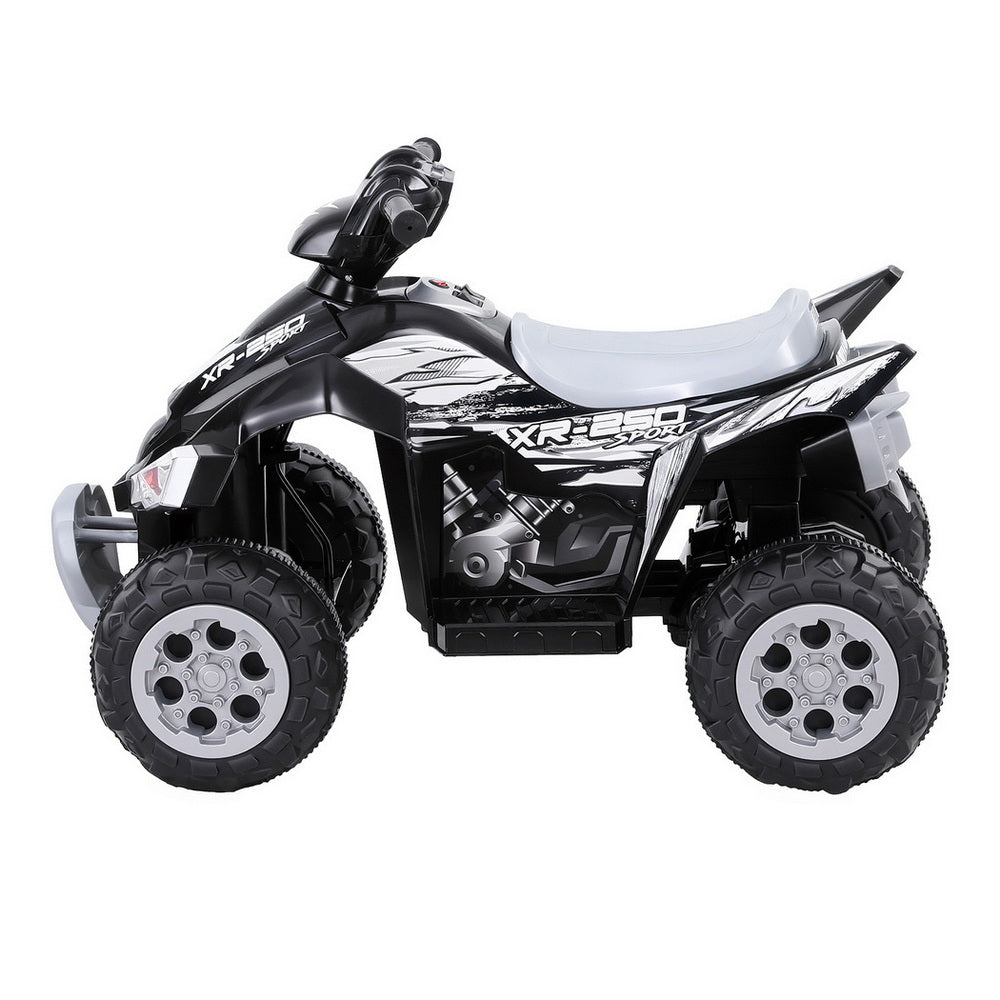 Black and white toy ATV on a white background