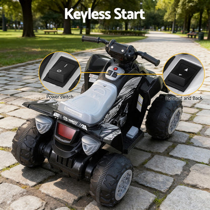 Children's ATV with keyless start feature on a paved path in a park.