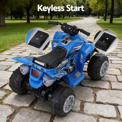 Blue toy ATV with keyless start feature on a stone path in a park.