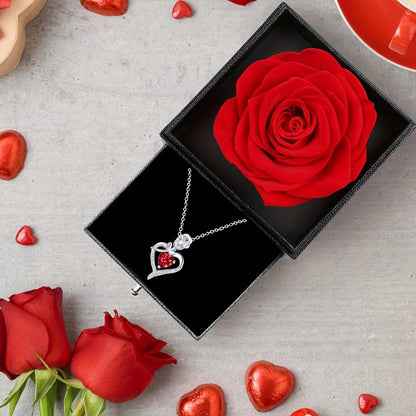 Rose Heart Pendant Necklace, copper-inlaid zirconia with ruby accents, adjustable chain. Symbolizing "I love you," it is a heartfelt jewelry gift for female relatives and friends, perfect for Christmas, Valentine’s Day, birthdays, and other holidays.