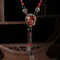 Bohemian style long necklace featuring retro beads and metal carved flowers with elegant dangling tassels adjustable 86cm chain suitable for pairing with sweaters and dresses perfect for daily wear or holiday occasions