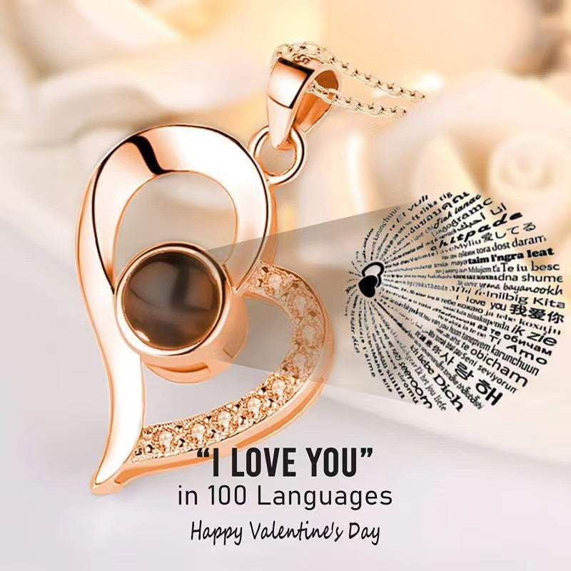 Rose Heart Projection Necklace, sparkling in rose gold, "I love you" in 100 languages, packaged with a single rose gift box – a romantic tech-infused gift.
