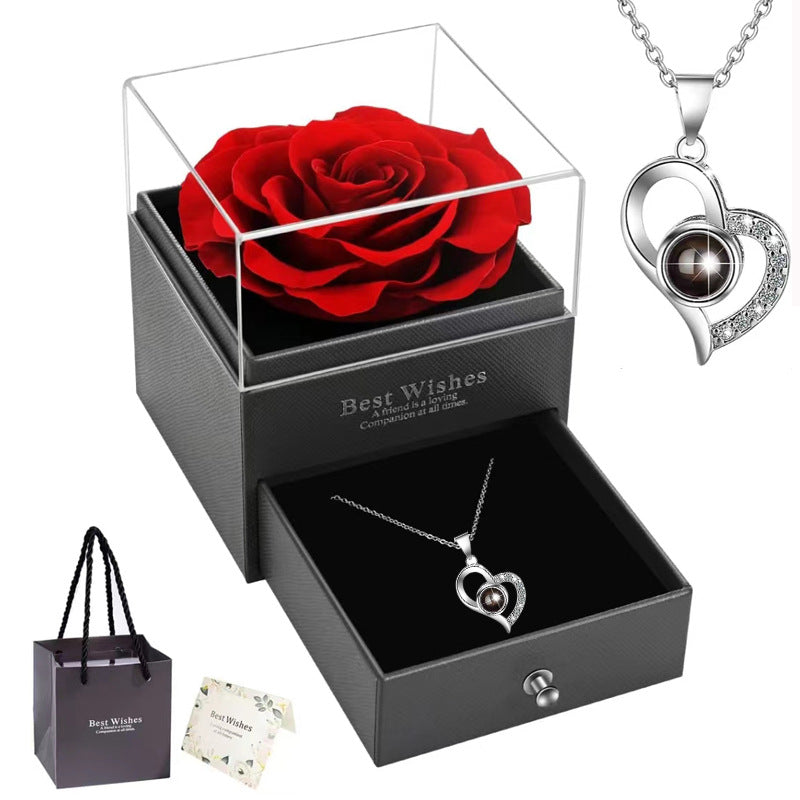 Rose Heart Projection Necklace, sparkling in rose gold, "I love you" in 100 languages, packaged with a single rose gift box – a romantic tech-infused gift.