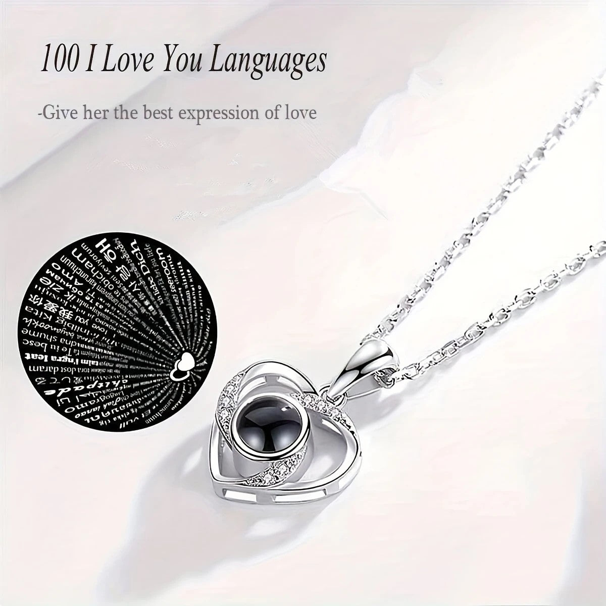 A Hundred Languages Heart-Shaped Projection Necklace Set, silver-plated with zirconia inlay, paired with an apple preserved rose gift box—a perfect fusion of technology and romance.