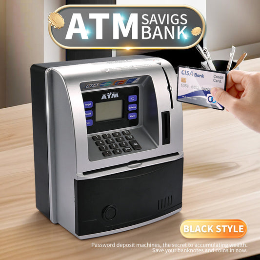 ATM savings bank machine with a hand holding a card, on a wooden surface.