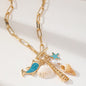 Gold Tone Paperclip Chain Toggle Necklace with Ocean Charms Dolphin Starfish and Seashell Pendant for Summer Beach Holiday