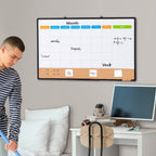 Person standing in a room with a digital whiteboard displaying a calendar and notes.