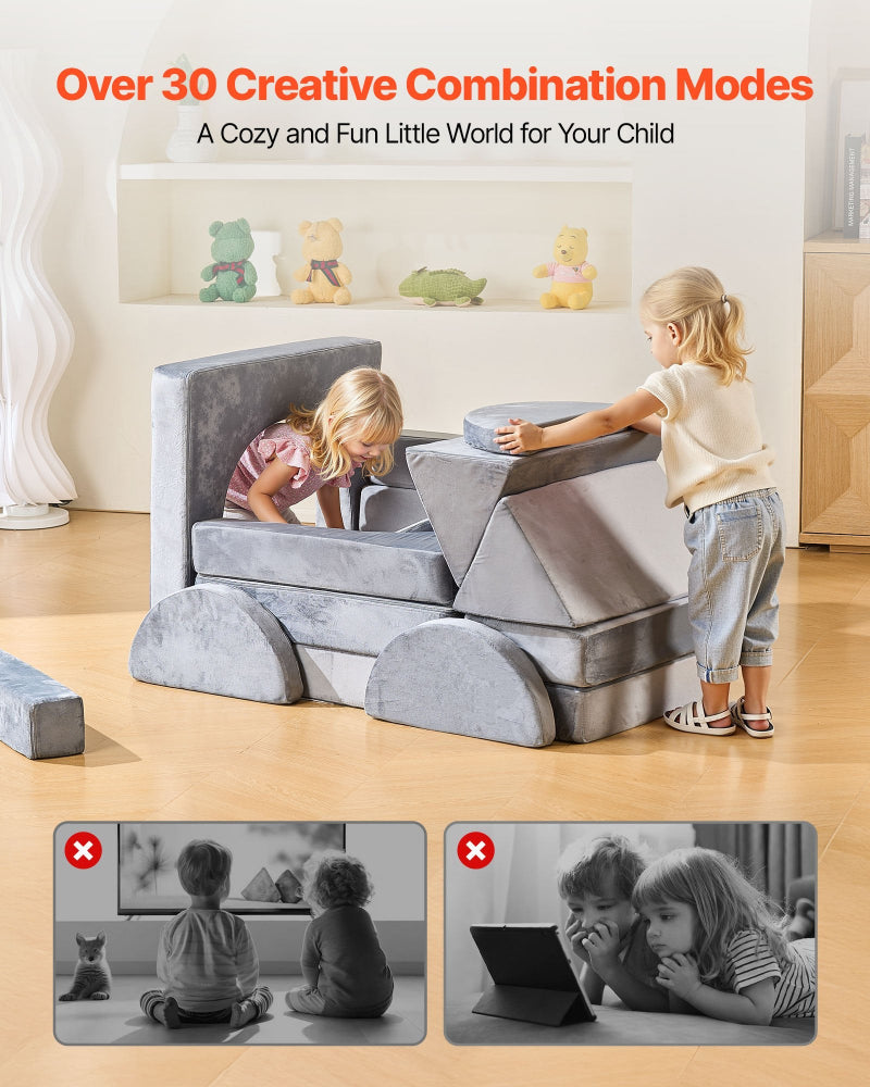 Children playing with a gray play structure in a room with toys on shelves.